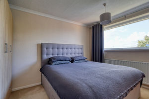 Bedroom One- click for photo gallery